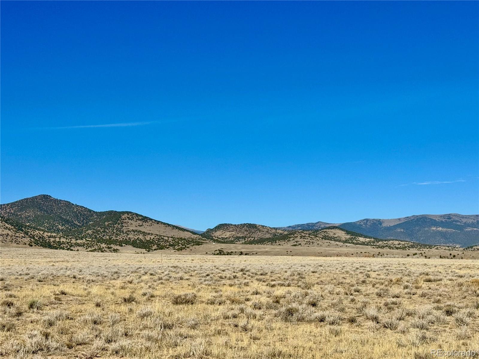 22580 County 3 Road La Jara, CO 81140 - Photo 6 of 18 a view of mountain with lake view