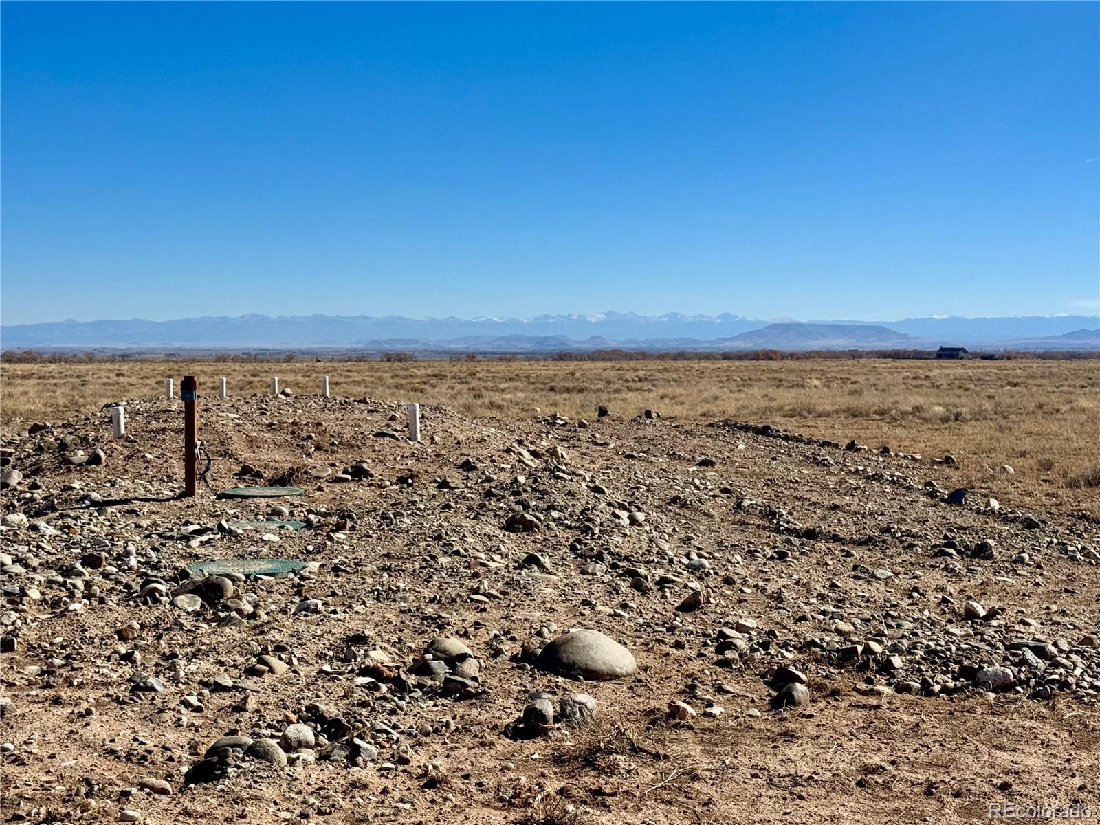 22580 County 3 Road La Jara, CO 81140 - Photo 9 of 18 wooden floor with an ocean view