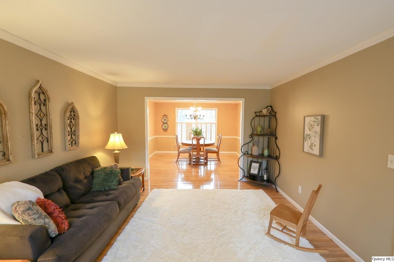 2123 South 30th Street Quincy, IL 62301 - Photo 9 of 36 a living room with furniture and a large window