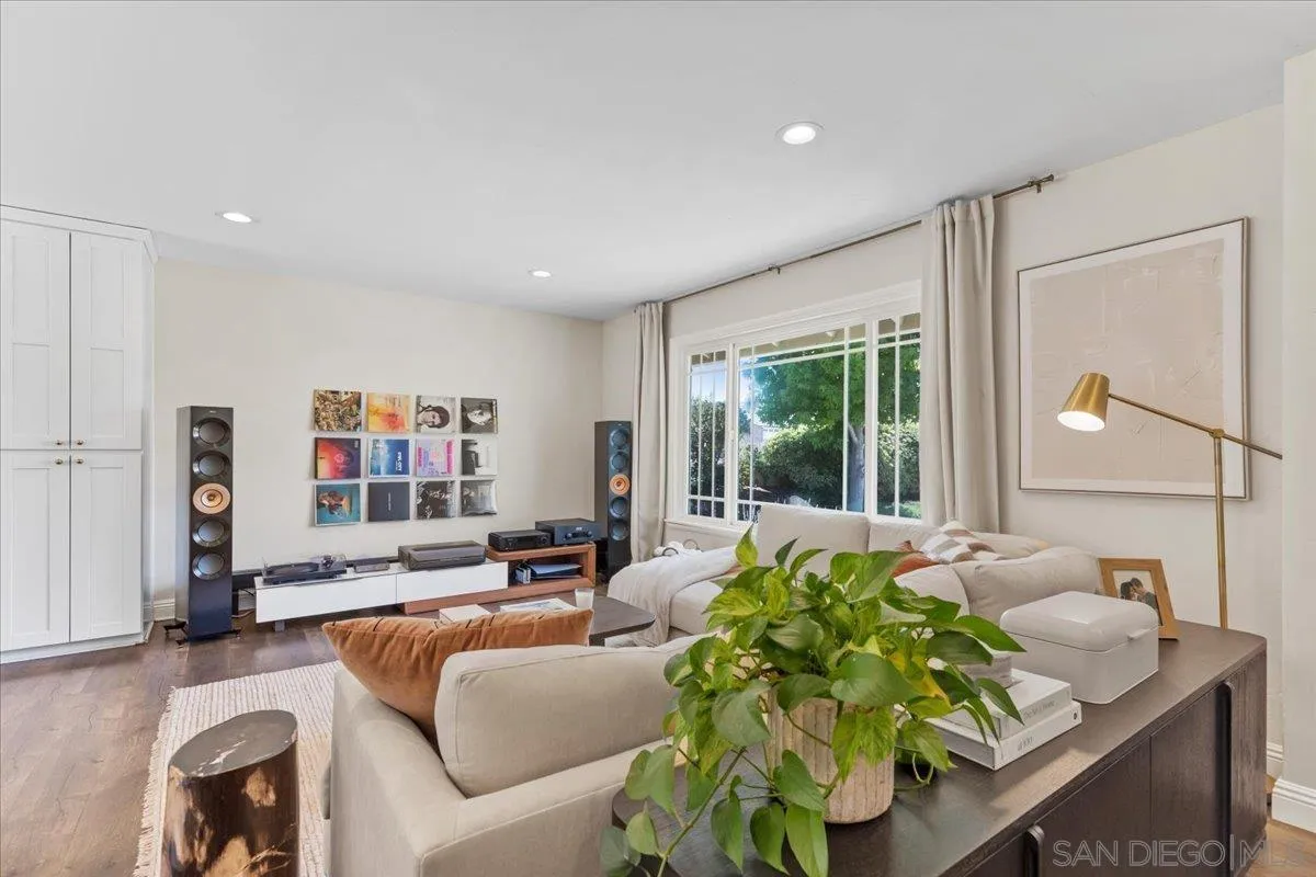 12243 Buckskin Trail Poway, CA 92064 - Photo 5 of 41 a living room with furniture and a large window