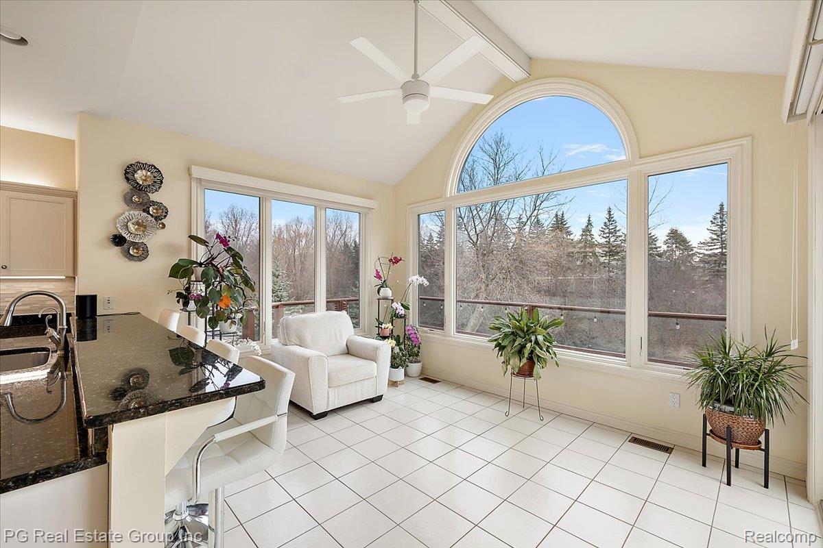 3571 Cedar Brook Drive Rochester, MI 48309 - Photo 31 of 57 Sunroom featuring a sink and tile patterned floors