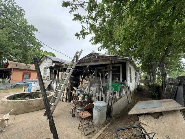 an outdoor space with patio and lake view