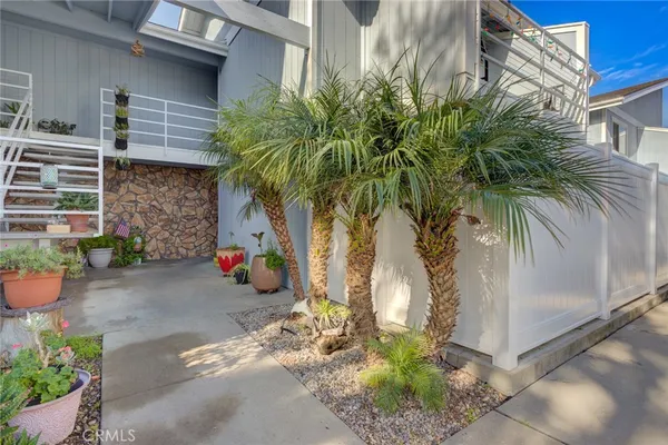 a view of a backyard of the house