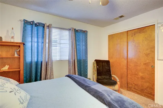 a view of a dining room with a potted plant