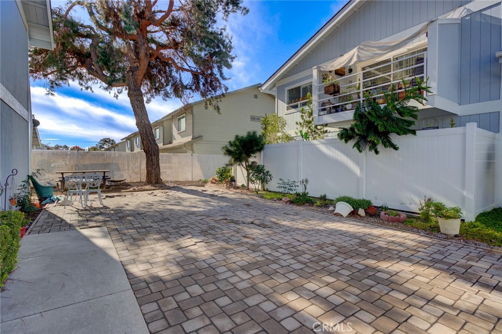 1165 Maple Street, Unit E Arroyo Grande, CA 93420 - Photo 4 of 50 a view of a house with a yard