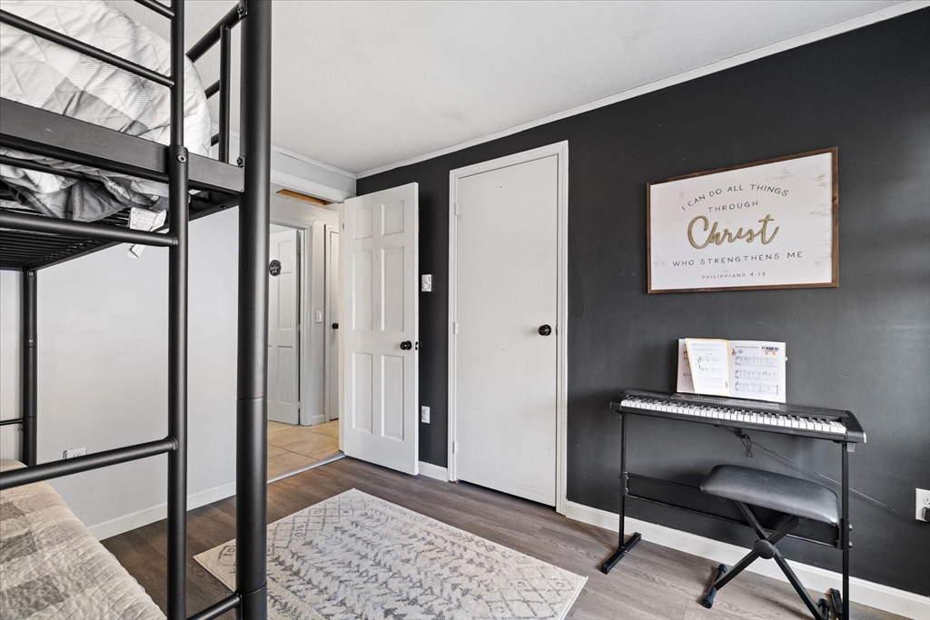 514 West Street Gardner, MA 01440 - Photo 11 of 37 a view of a hallway with a workspace