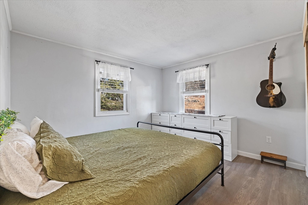 514 West Street Gardner, MA 01440 - Photo 13 of 37 a bedroom with a bed and a window