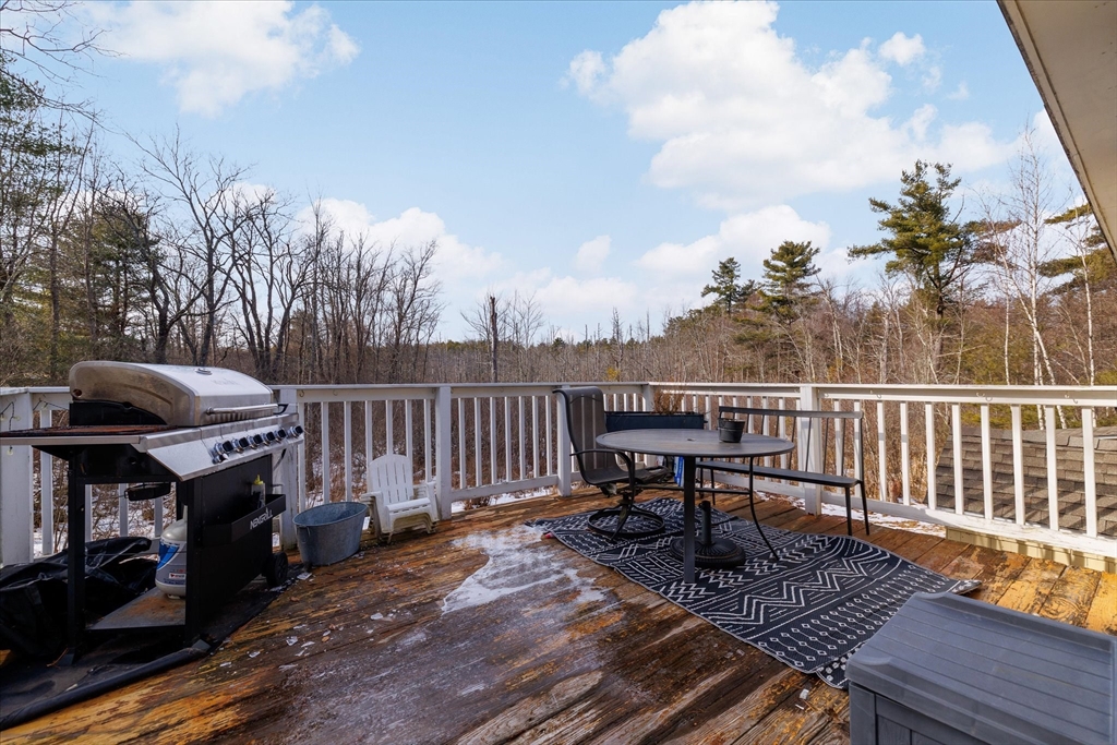 514 West Street Gardner, MA 01440 - Photo 25 of 37 a view of a deck with wooden floor and seating space