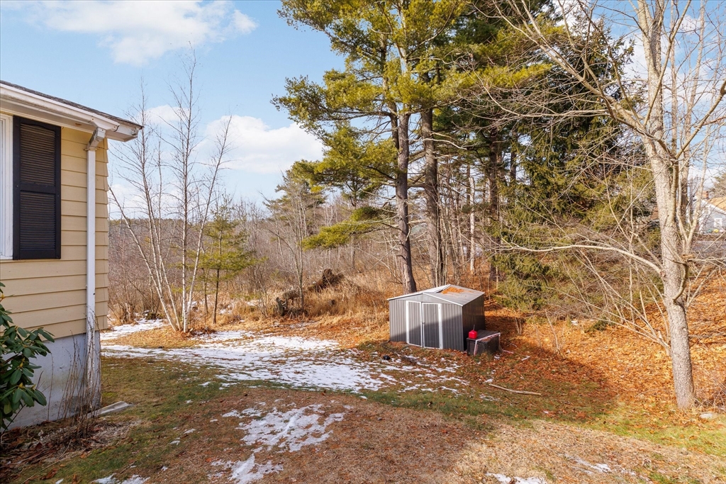 514 West Street Gardner, MA 01440 - Photo 28 of 37 a view of a yard with large trees
