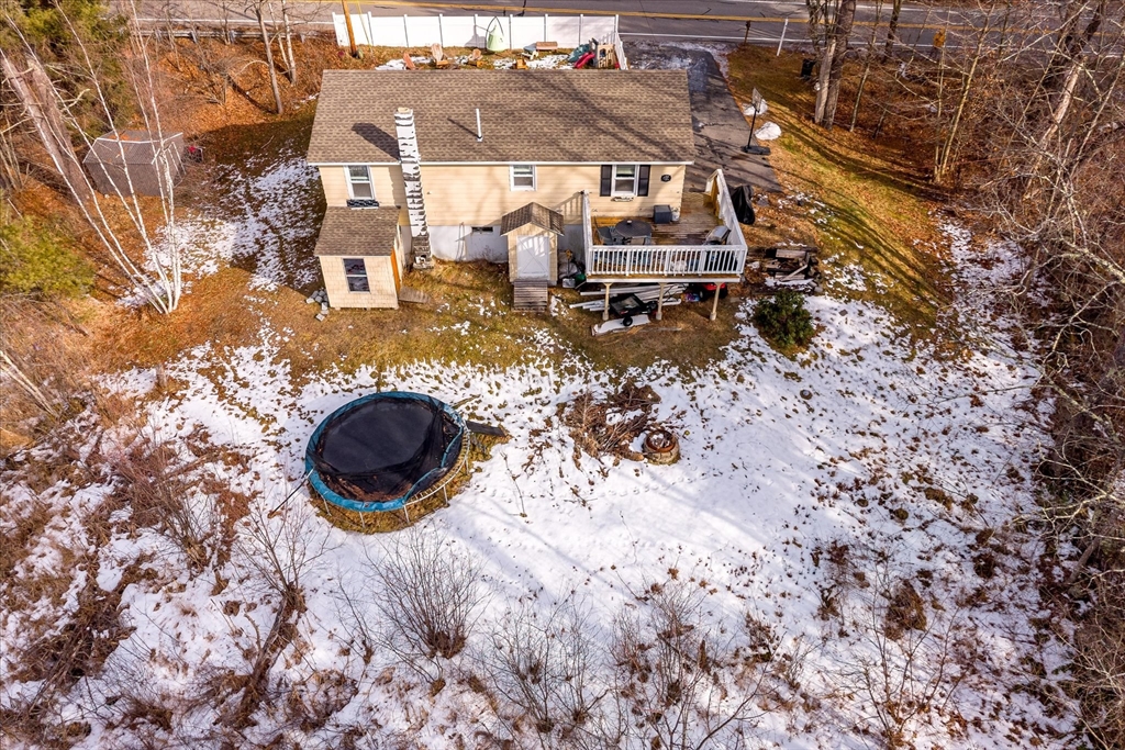 514 West Street Gardner, MA 01440 - Photo 30 of 37 a backyard of a house with table and chairs