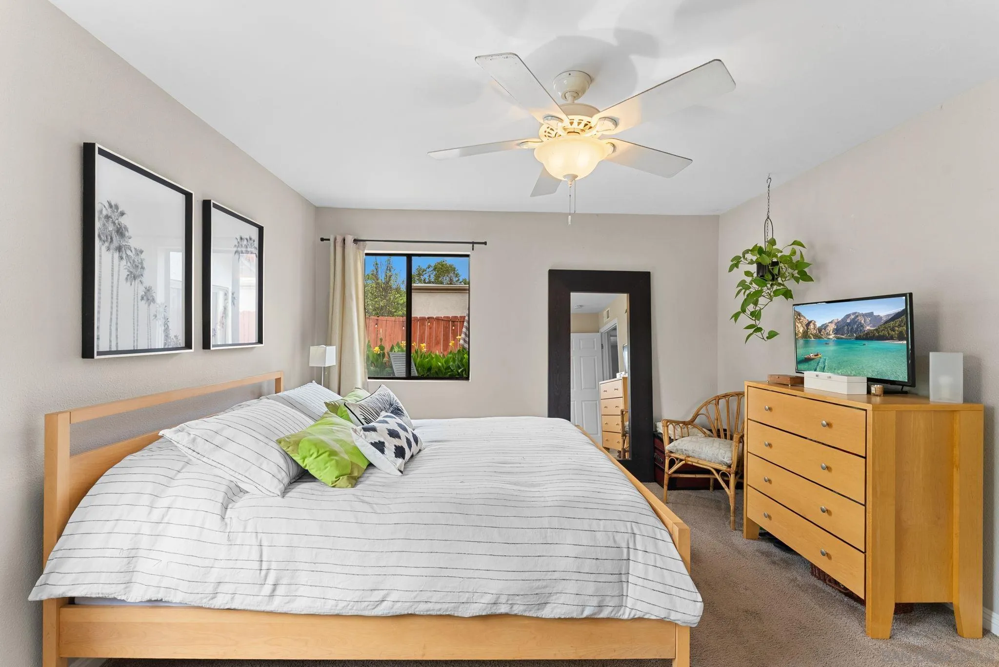 4444 Silver Birch Way Oceanside, CA 92057 - Photo 16 of 54 a bedroom with a bed dresser and window