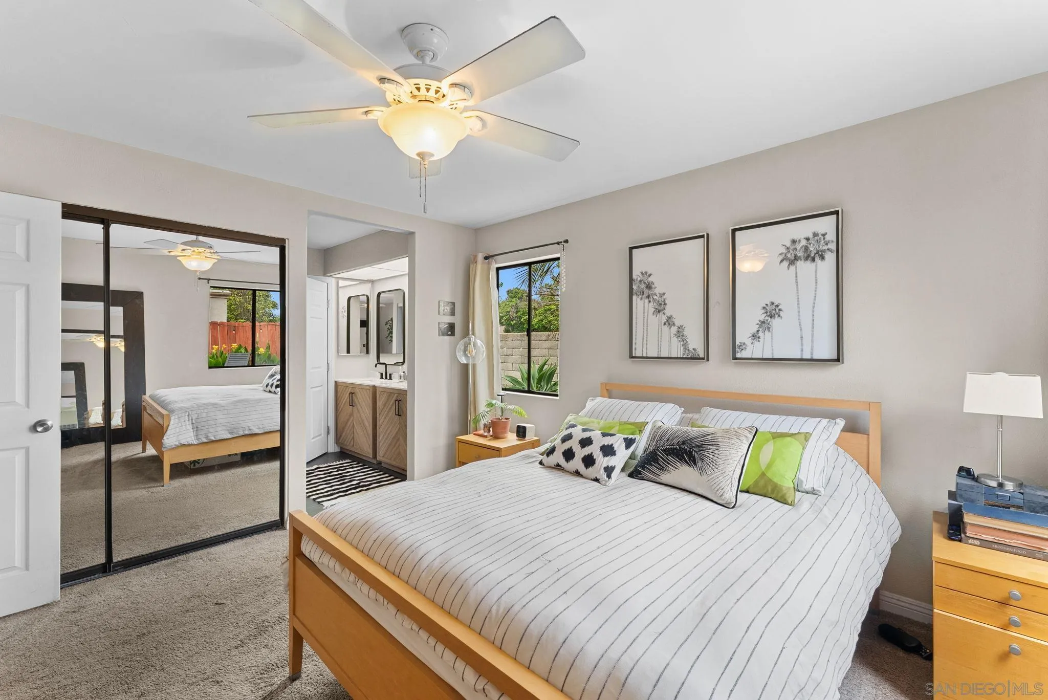 4444 Silver Birch Way Oceanside, CA 92057 - Photo 17 of 54 a bedroom with a bed and wooden floor