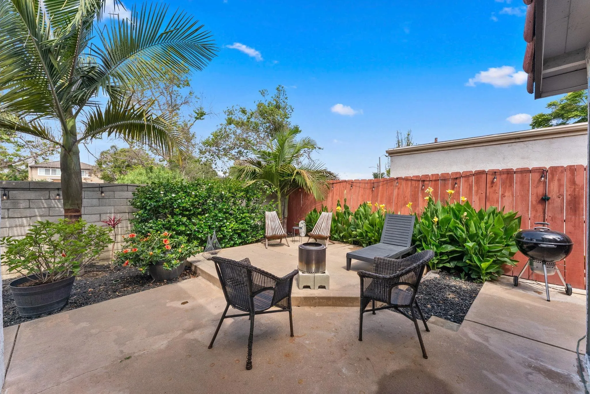 4444 Silver Birch Way Oceanside, CA 92057 - Photo 27 of 54 a view of a backyard with a sitting area and furniture