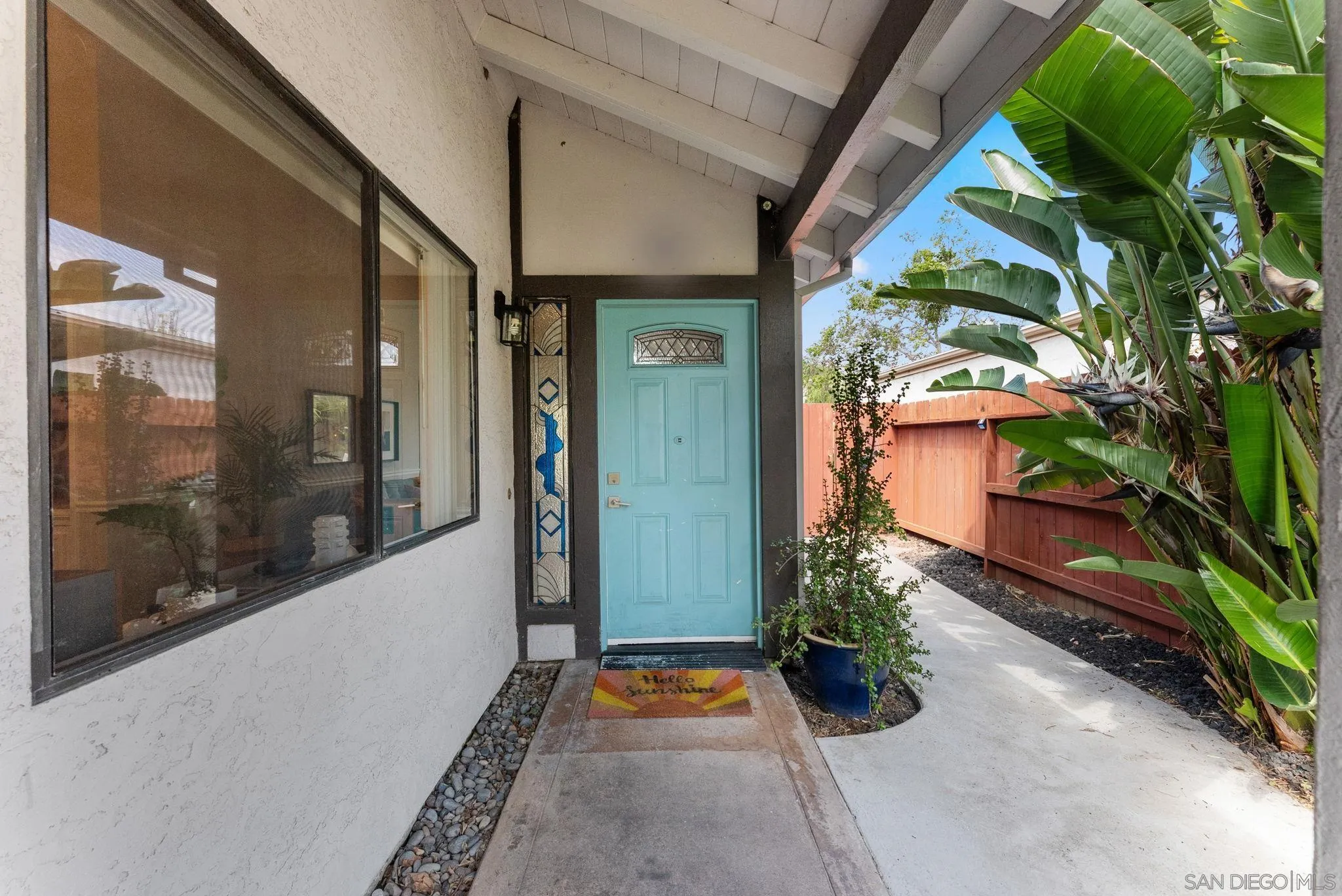 4444 Silver Birch Way Oceanside, CA 92057 - Photo 3 of 54 a front view of a house with a yard