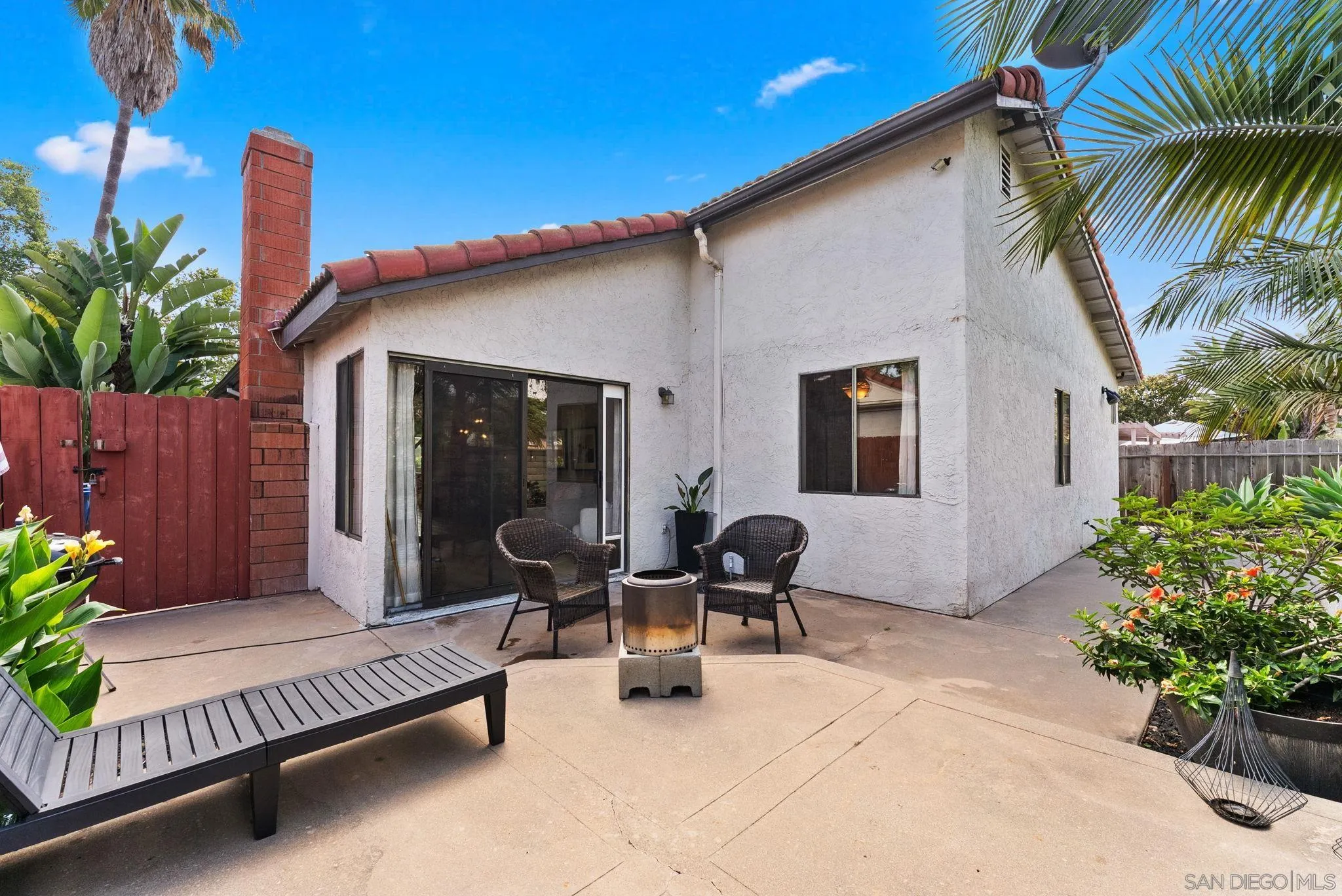 4444 Silver Birch Way Oceanside, CA 92057 - Photo 31 of 54 a backyard of a house with seating space
