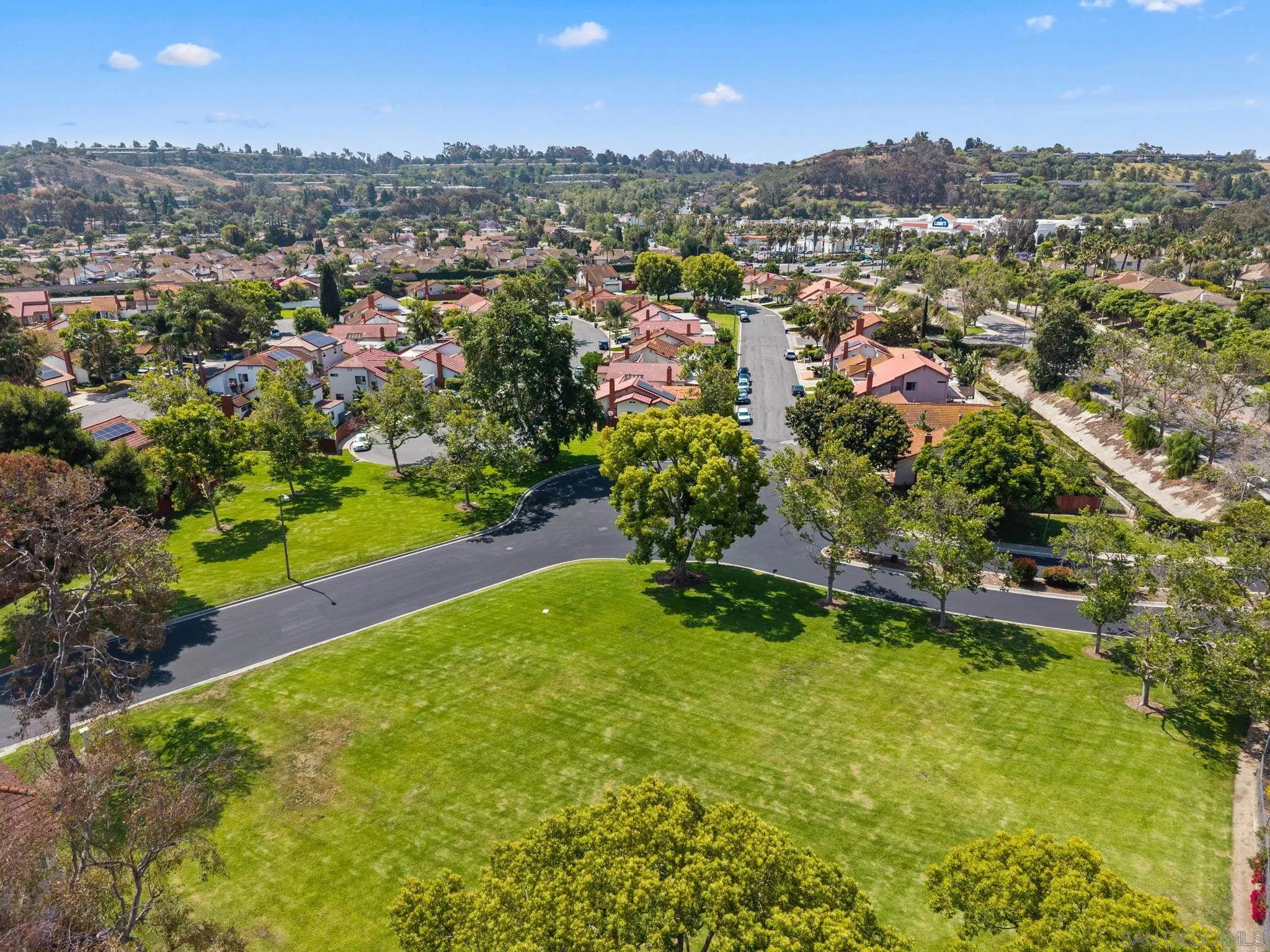 4444 Silver Birch Way Oceanside, CA 92057 - Photo 34 of 54 an aerial view of residential houses with outdoor space and trees
