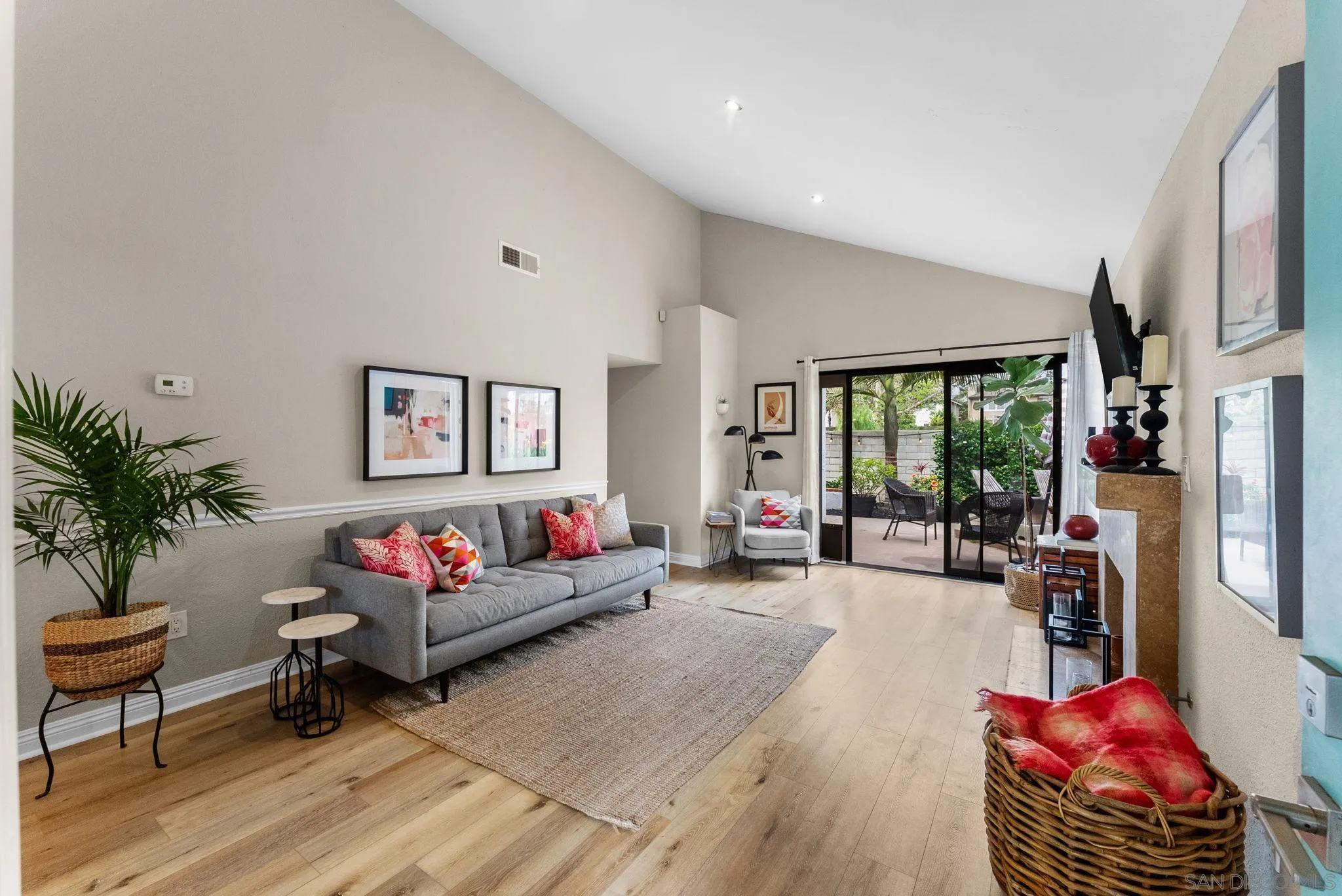 4444 Silver Birch Way Oceanside, CA 92057 - Photo 4 of 54 a living room with furniture fireplace and potted plants