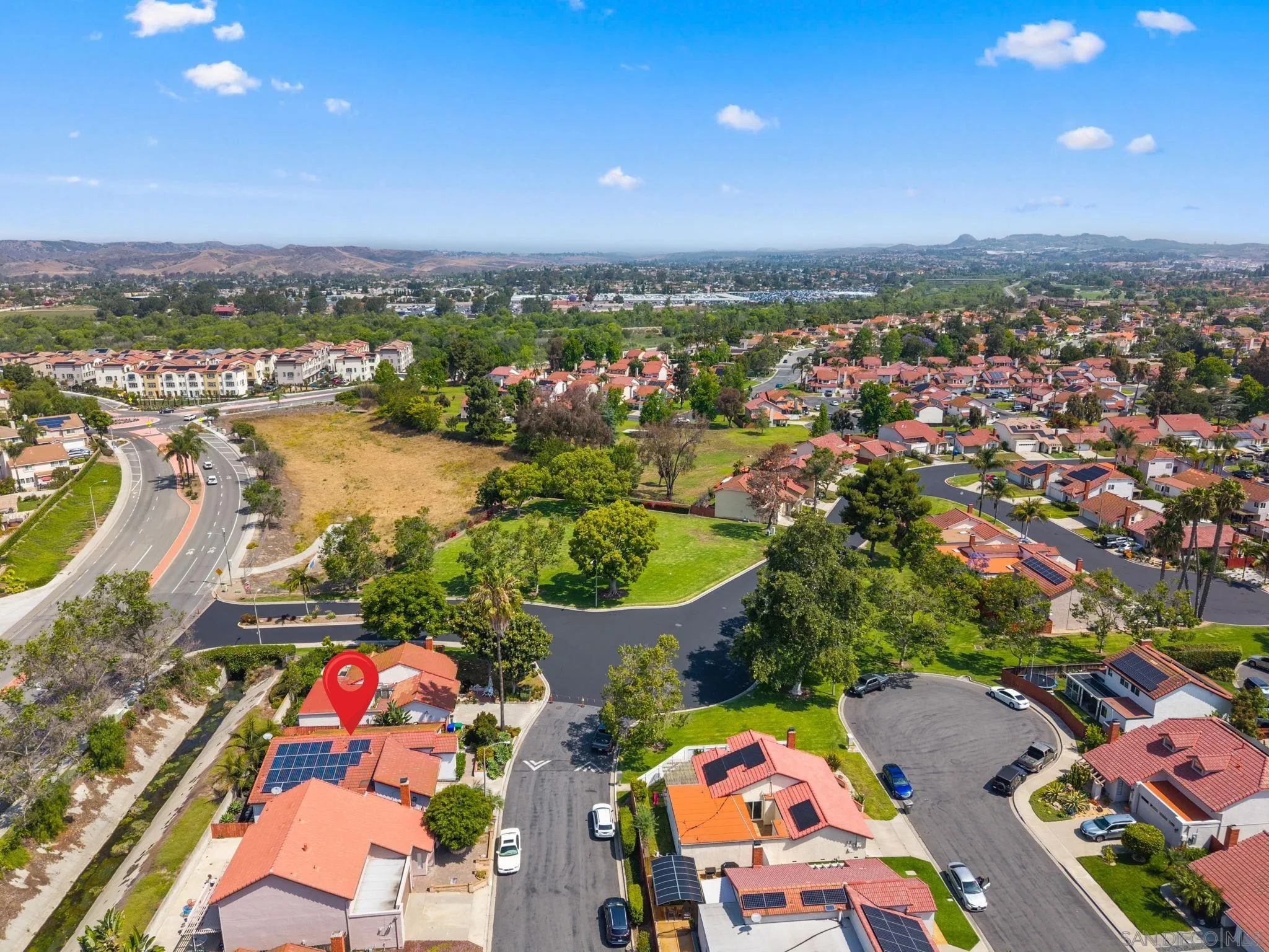 4444 Silver Birch Way Oceanside, CA 92057 - Photo 42 of 54 an aerial view of a city with lots of residential buildings ocean and mountain view in back