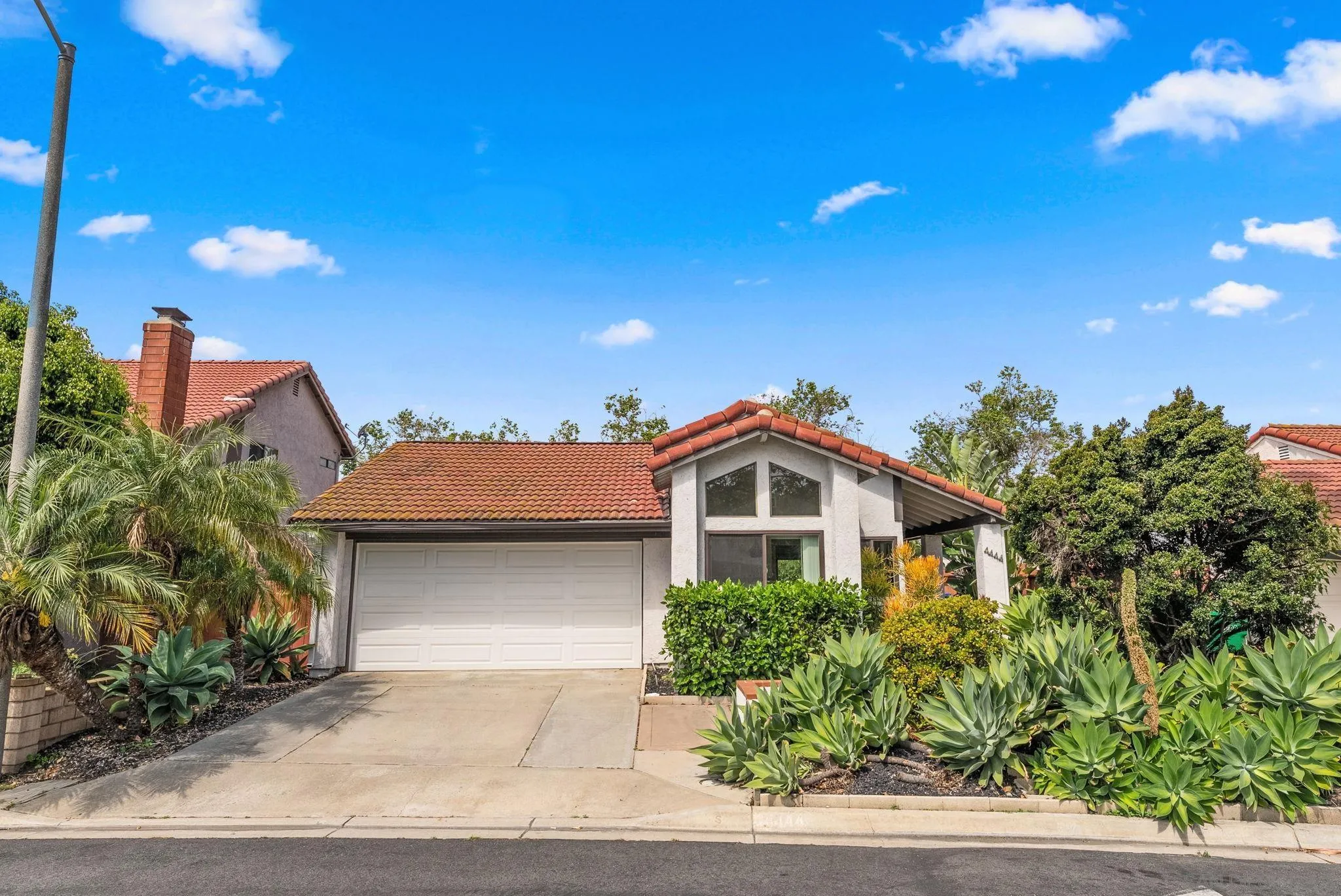 4444 Silver Birch Way Oceanside, CA 92057 - Photo 52 of 54 a front view of a house with a yard