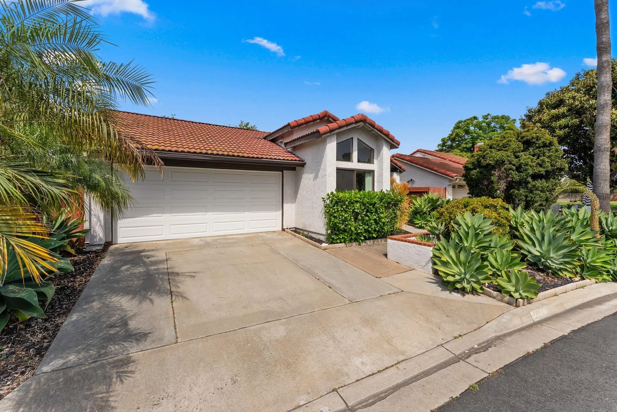 4444 Silver Birch Way Oceanside, CA 92057 - Photo 53 of 54 a front view of a house with a yard