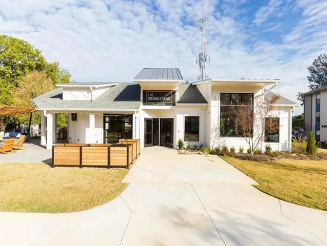 a front view of house with garage and seating area