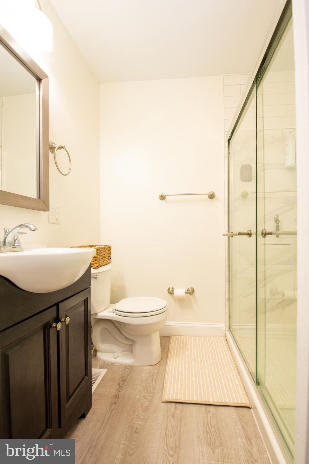 452 Elm Avenue Maple Shade, NJ 08052 - Photo 12 of 31 a bathroom with a sink a toilet and shower