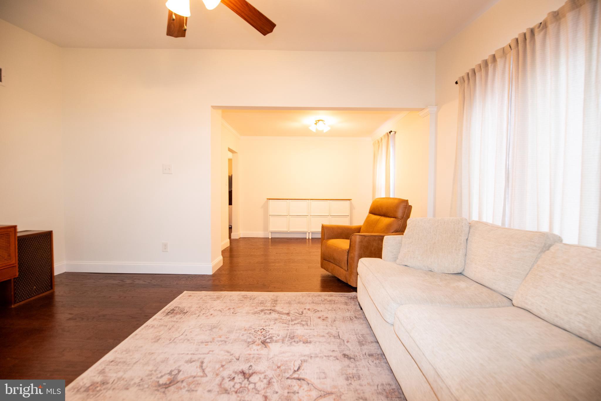 452 Elm Avenue Maple Shade, NJ 08052 - Photo 15 of 31 a living room with furniture and a large window