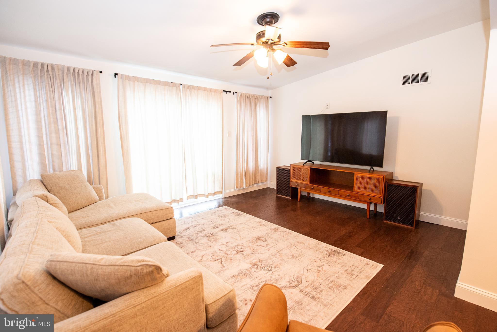 452 Elm Avenue Maple Shade, NJ 08052 - Photo 17 of 31 a living room with furniture and a flat screen tv