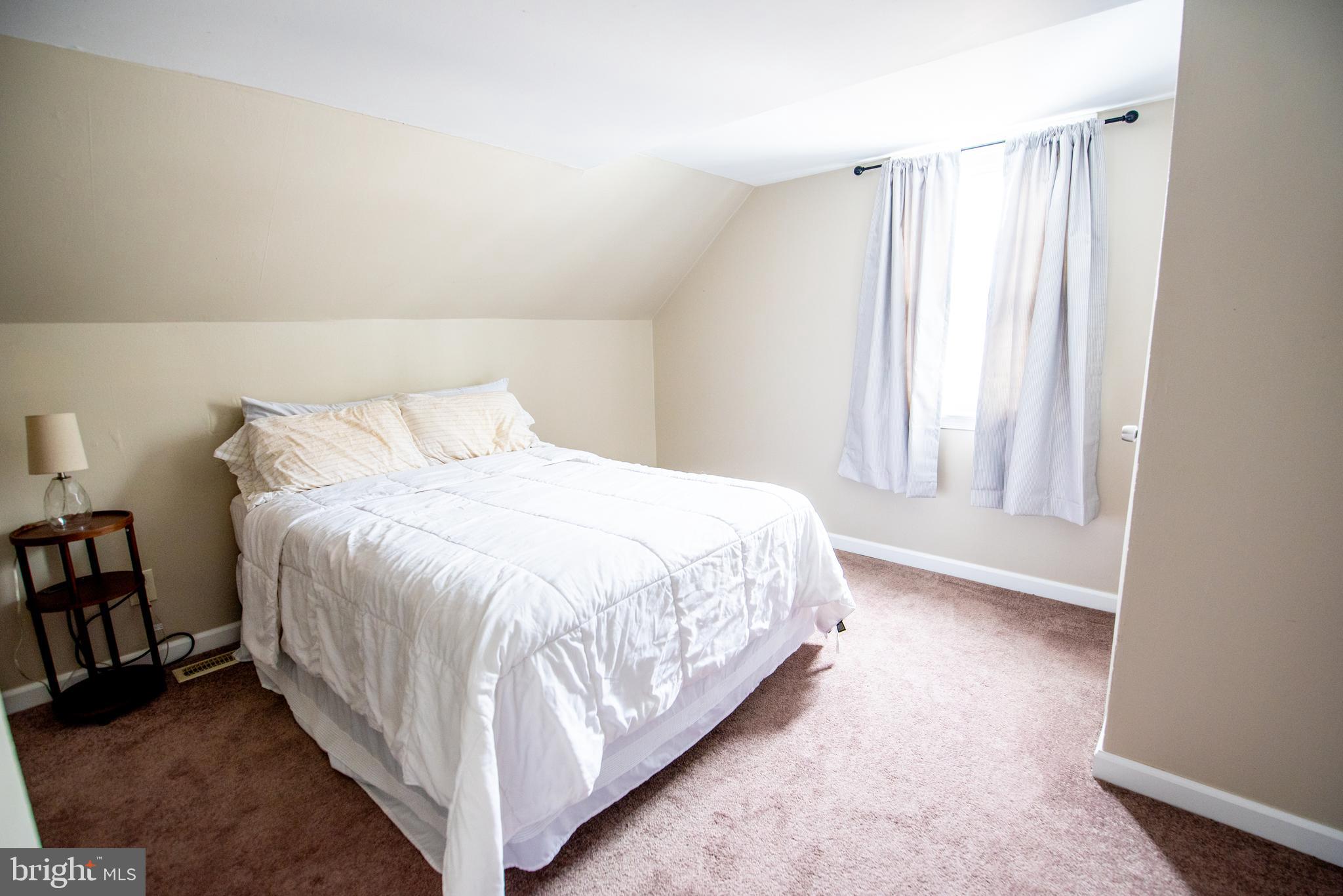 452 Elm Avenue Maple Shade, NJ 08052 - Photo 19 of 31 a large white bed in a white room