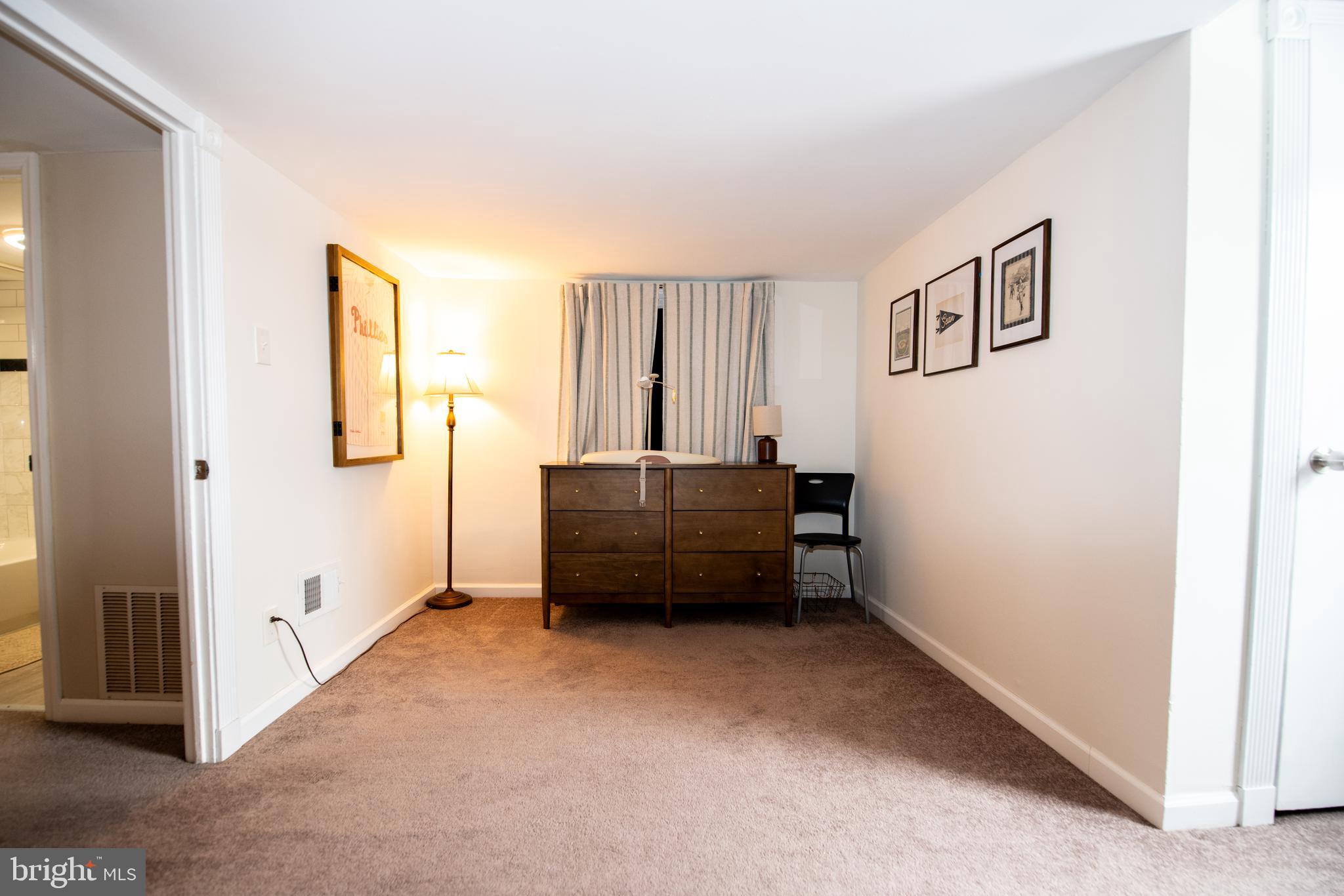 452 Elm Avenue Maple Shade, NJ 08052 - Photo 25 of 31 a living room with a bed and a window