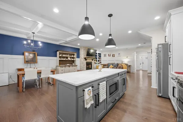 a kitchen with stainless steel appliances cabinets a window and a sink