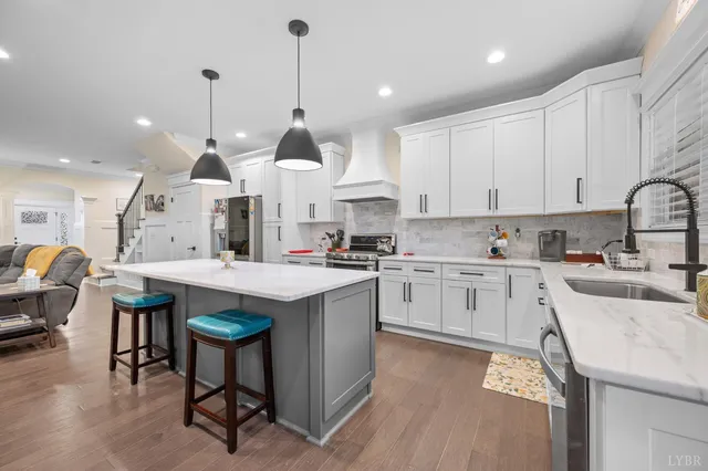 a view of kitchen with cabinets and counter space
