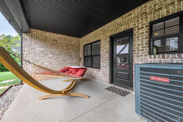 a view of a brick building with many windows