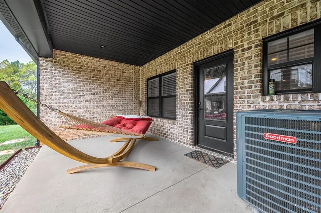 a view of a brick building with many windows