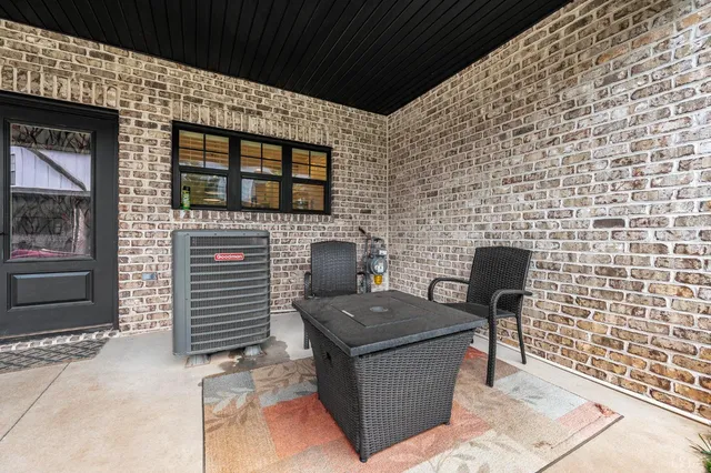 a front view of a building with a road