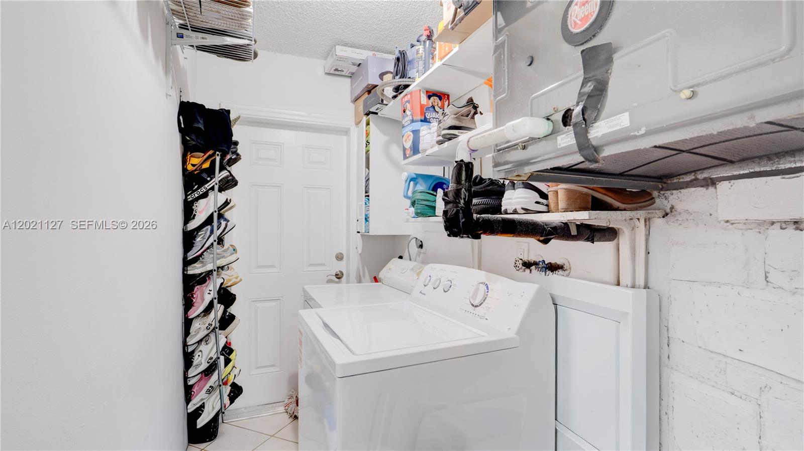 3611 Southwest 23rd Street Miami, FL 33145 - Photo 42 of 56 3611 - laundry room with access to side of property