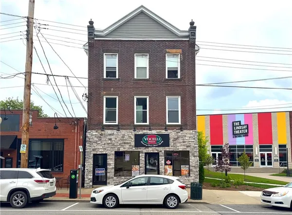 a car parked in front of a building