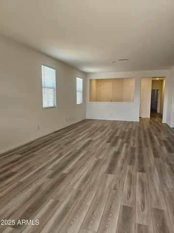 a view of an empty room and window