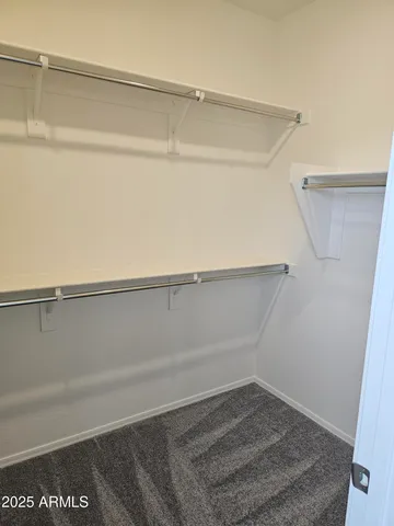 a view of small space with racks on the wall