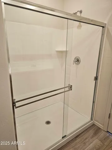 a bathroom with a glass shower