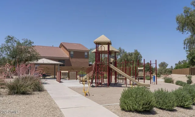 a view of a house with a park