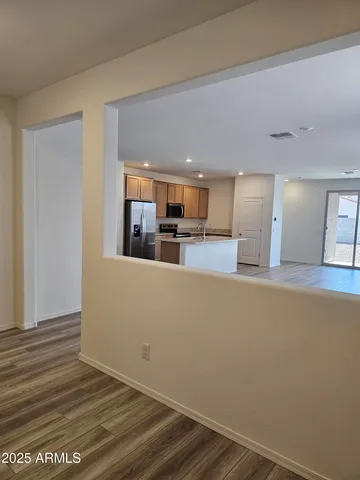 a view of a kitchen with a sink