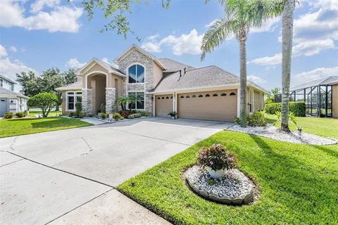 $695,000 | 19119 Mandarin Grove Place, Tampa, FL 33647