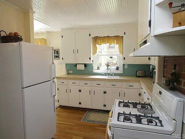 4518 Erwin Road Durham, NC 27705 - Photo 4 of 9 Custom limestone tile counters,all appliances remain! Other
