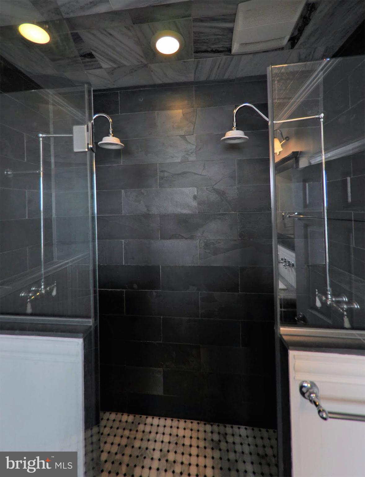 308 Kingston Road Baltimore, MD 21229 - Photo 14 of 30 a bathroom with a shower
