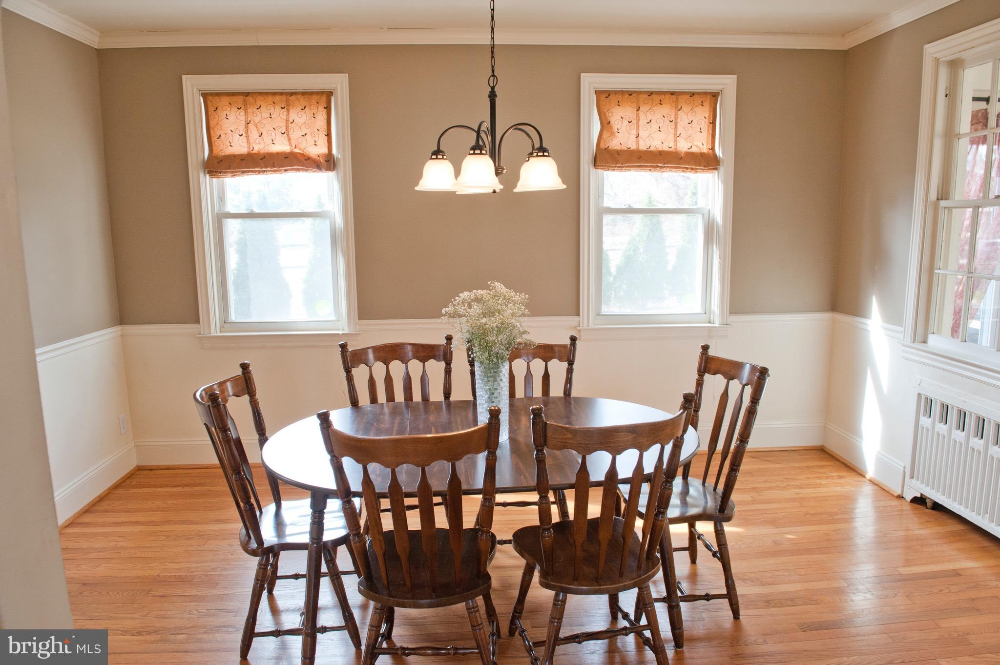 308 Kingston Road Baltimore, MD 21229 - Photo 7 of 30 a view of a dining room with furniture window and wooden floor