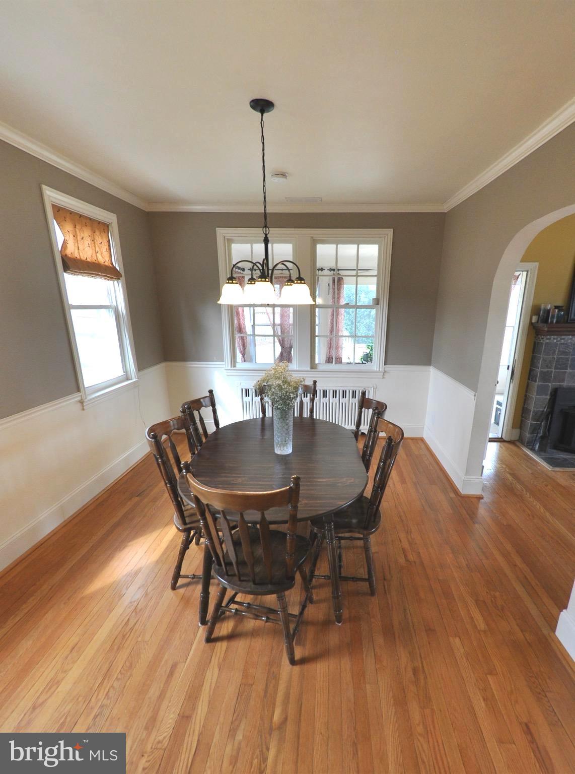 308 Kingston Road Baltimore, MD 21229 - Photo 8 of 30 a view of a dining room with furniture window and wooden floor