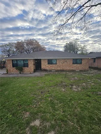 a view of a house with a big yard