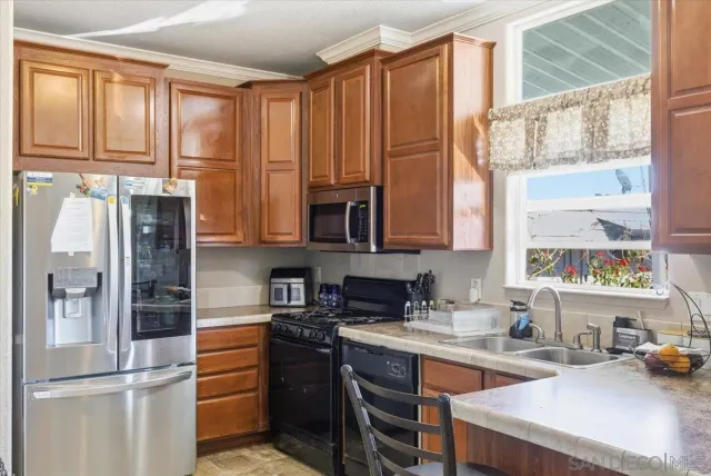 a bathroom with a sink a toilet and a bathtub