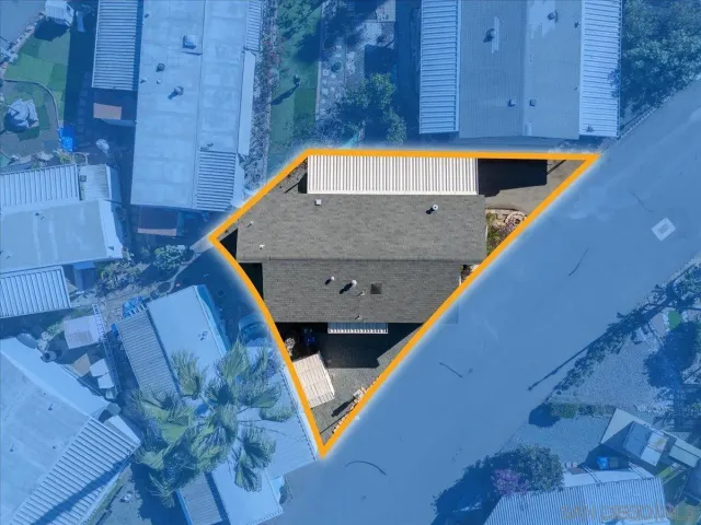 a terrace with outdoor seating and city view